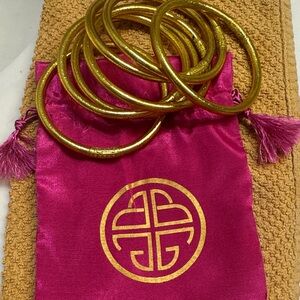 Budah Girl 7 Gold Bangles with Pink Satin Bag